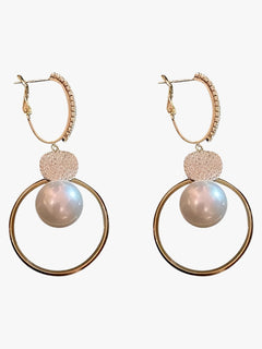 Evelyn | Strålende elegant - Oversized pareloorbellen med gyldne accenter