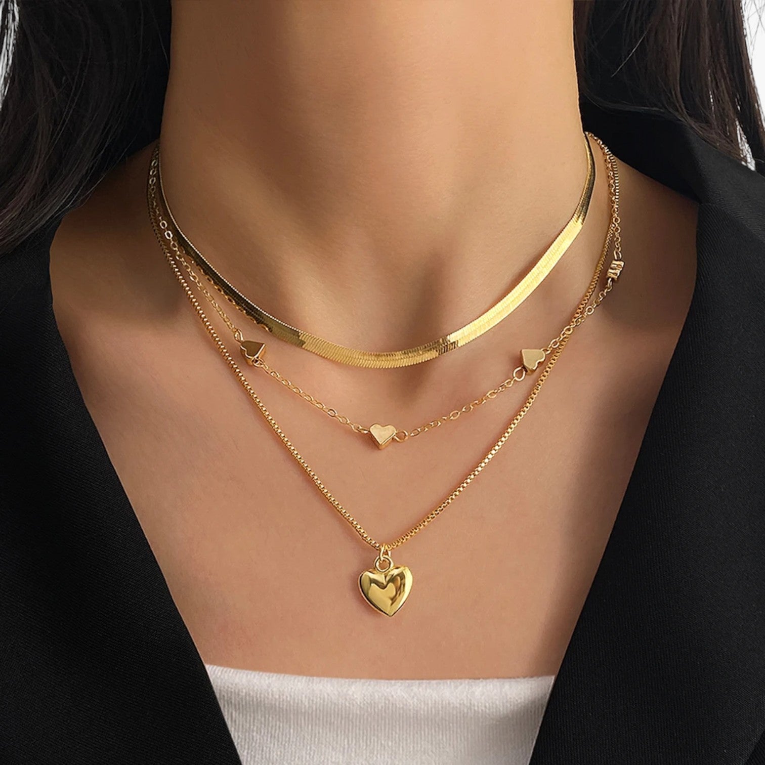 Isabelle | Eleganza lag med lag - Hjertesmykket der lyser op din stil - - Isabelle | Eleganza lag med lag - Hjertesmykket der lyser op din stil - €25 - {{ product_tags }