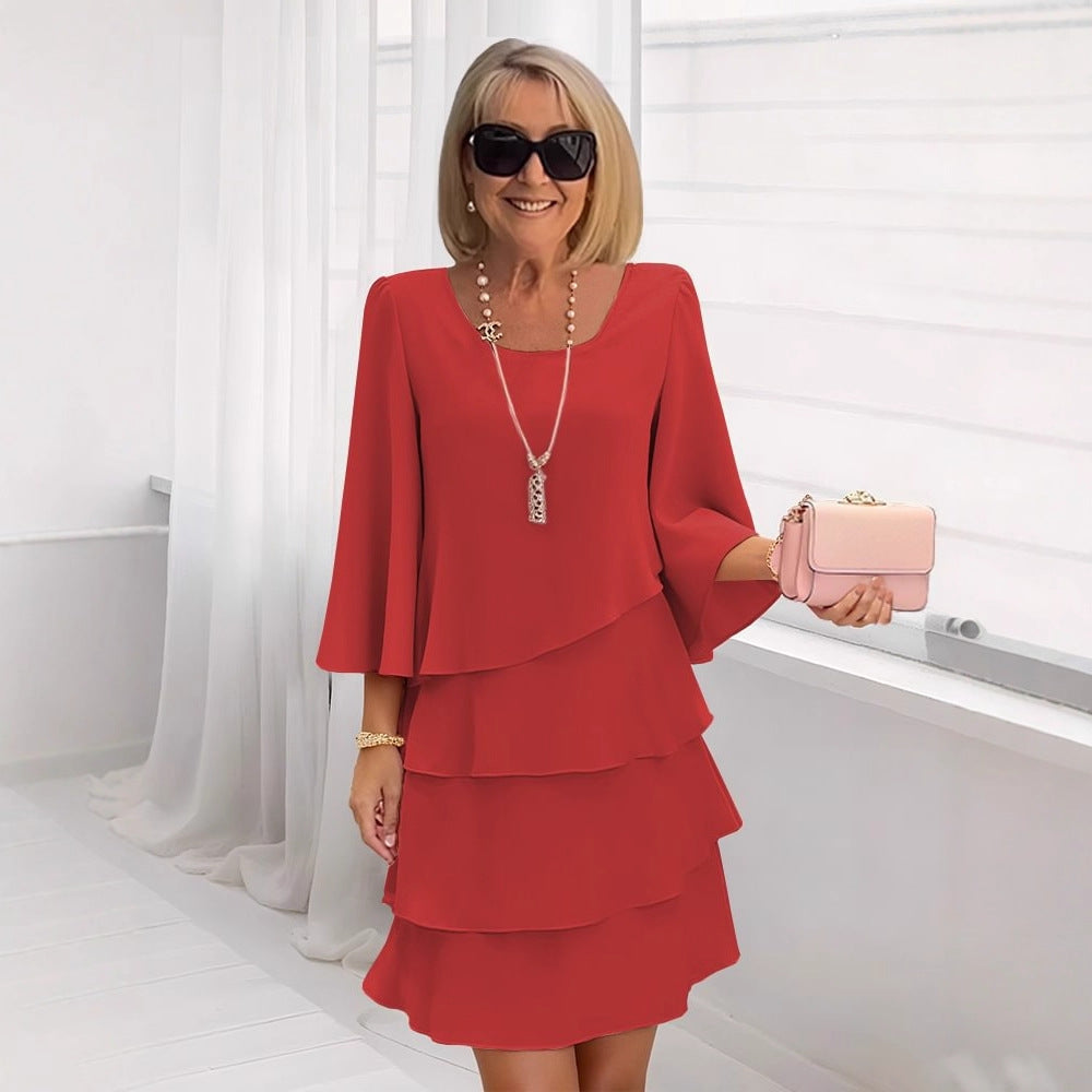 Stilfuld midikjole - A-line snit, feminine flæsedetaljer