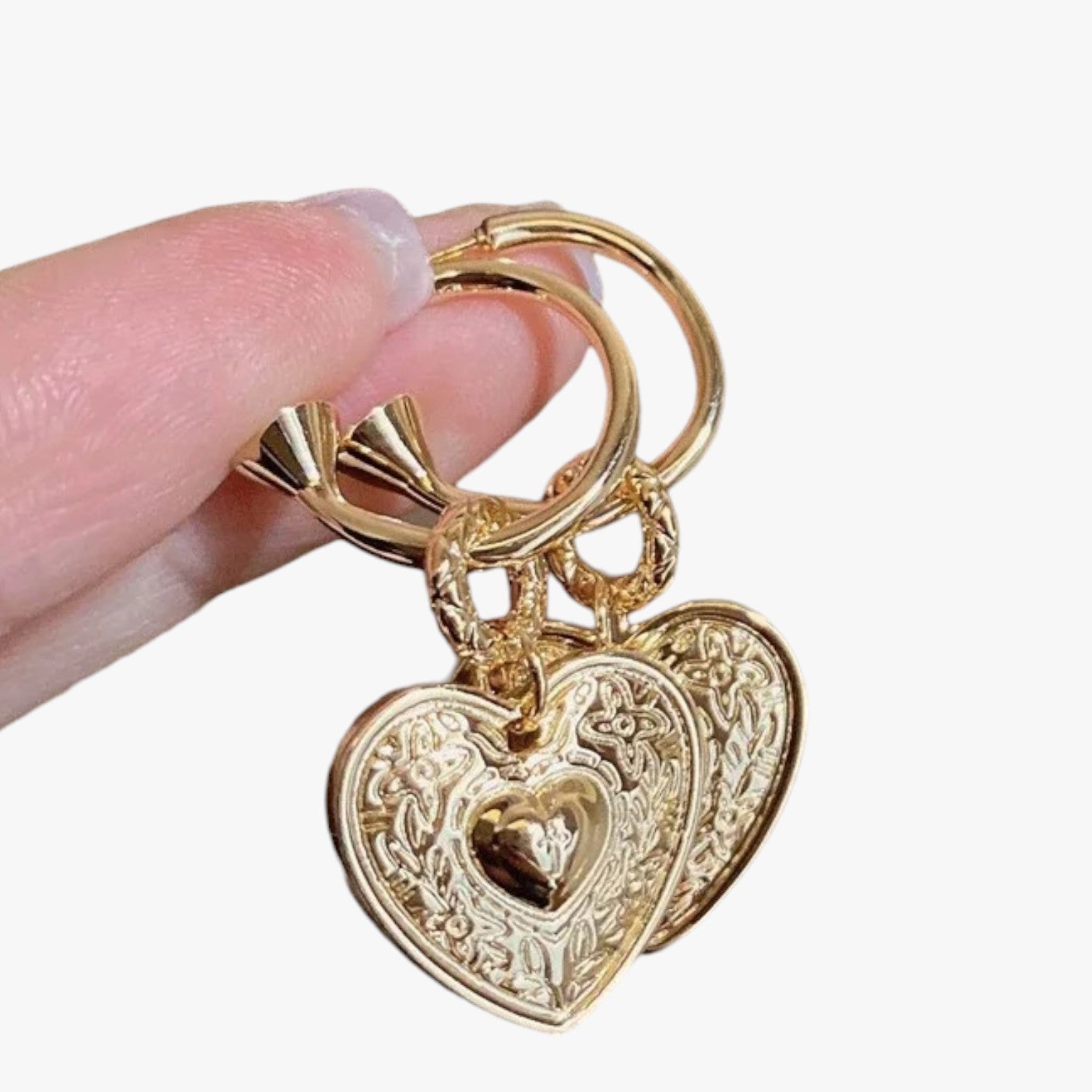 Martha | Elegante hjerteformede retroøreringe - - Martha | Elegante hjerteformede retroøreringe - €25 - {{ product_tags }