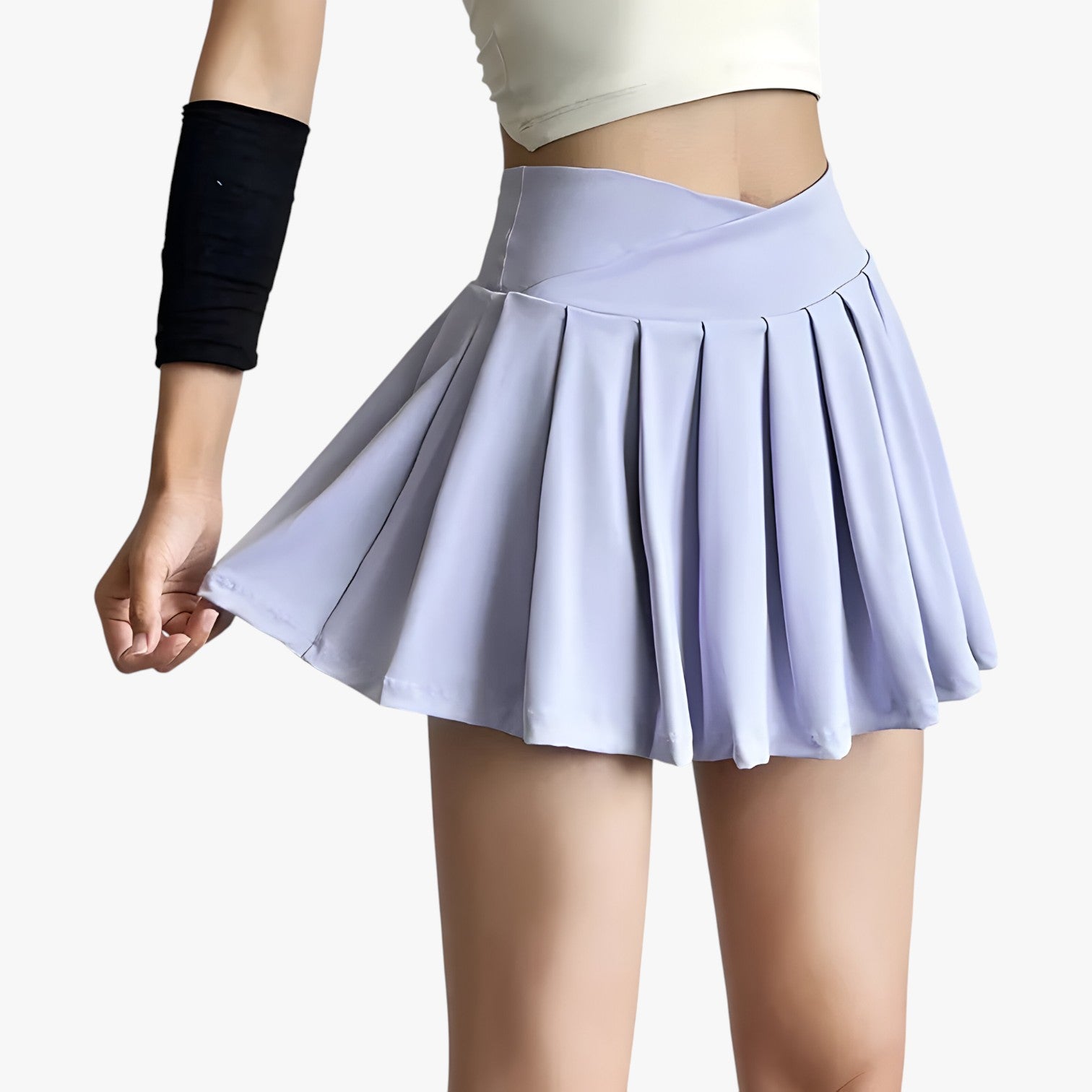 Luna | Højtaljet plisseret sportsskørt med indbyggede shorts - lilla - Luna | Højtaljet plisseret sportsskørt med indbyggede shorts - €25 - {{ product_tags }