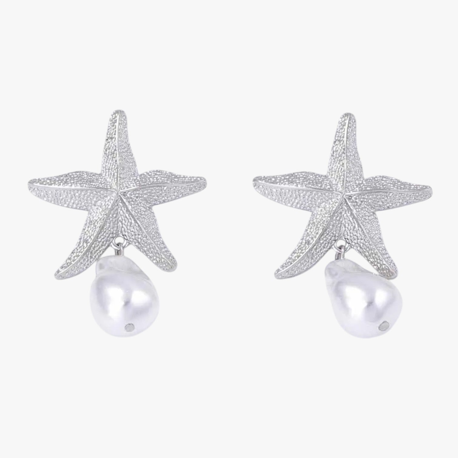 Xyla | Stilfulde skjellformede øreringe til en sommerlig stemning - Argento - Xyla | Stilfulde skjellformede øreringe til en sommerlig stemning - €25 - {{ product_tags }
