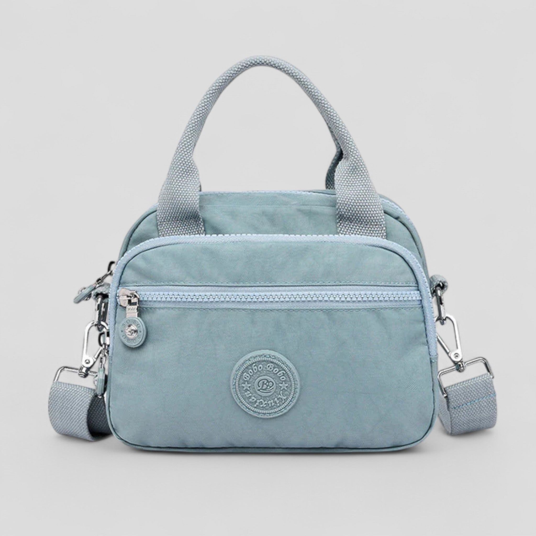 DOUTZEN™ | Ensfarvet, afslappet nylon skuldertaske med lynlås - Lyseblå - DOUTZEN™ | Ensfarvet, afslappet nylon skuldertaske med lynlås - €25 - {{ product_tags }