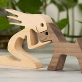 Wooden sculpture of person with dog, minimalist home decoration