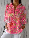 Elizabeth - Blusa floreale tropicale
