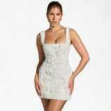 Elena - Short, tight-fitting dress with 3D pink sculpted appliqué