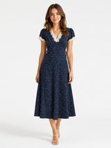 Elsa | Midi skirt with polka dots, lace details, and embroidered flower