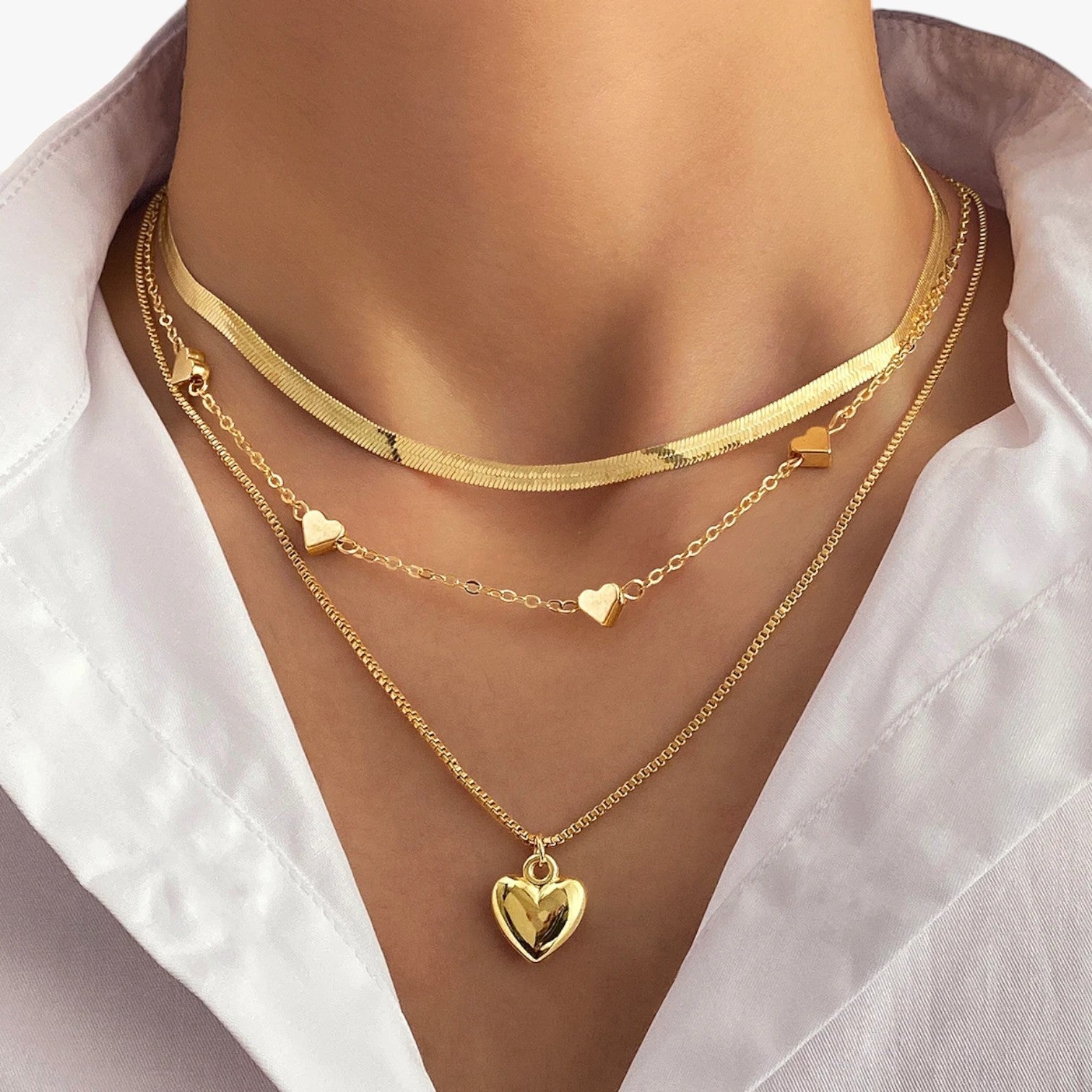 Isabelle | Eleganza lag med lag - Hjertesmykket der lyser op din stil - - Isabelle | Eleganza lag med lag - Hjertesmykket der lyser op din stil - €25 - {{ product_tags }