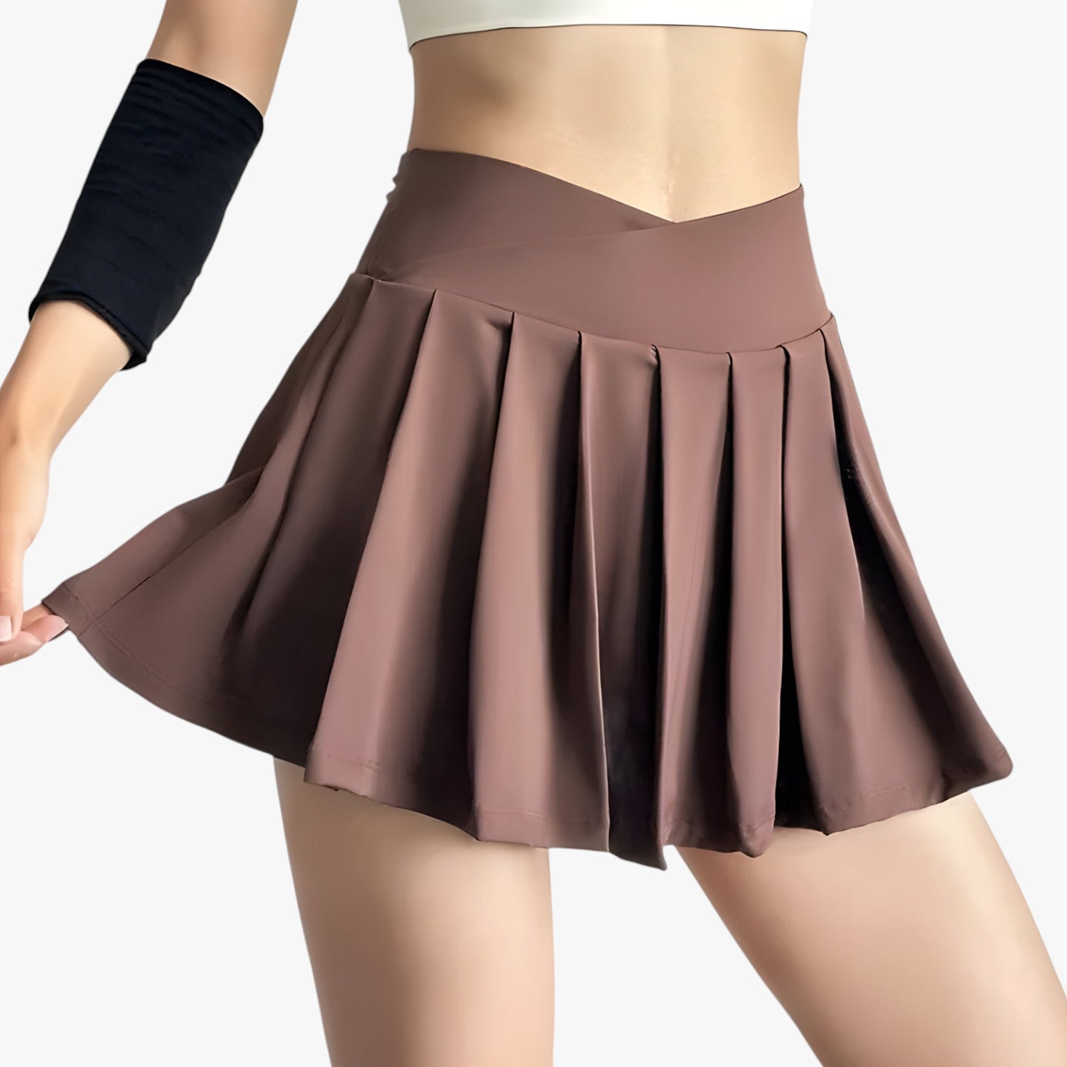 Luna | Højtaljet plisseret sportsskørt med indbyggede shorts - - Luna | Højtaljet plisseret sportsskørt med indbyggede shorts - €25 - {{ product_tags }
