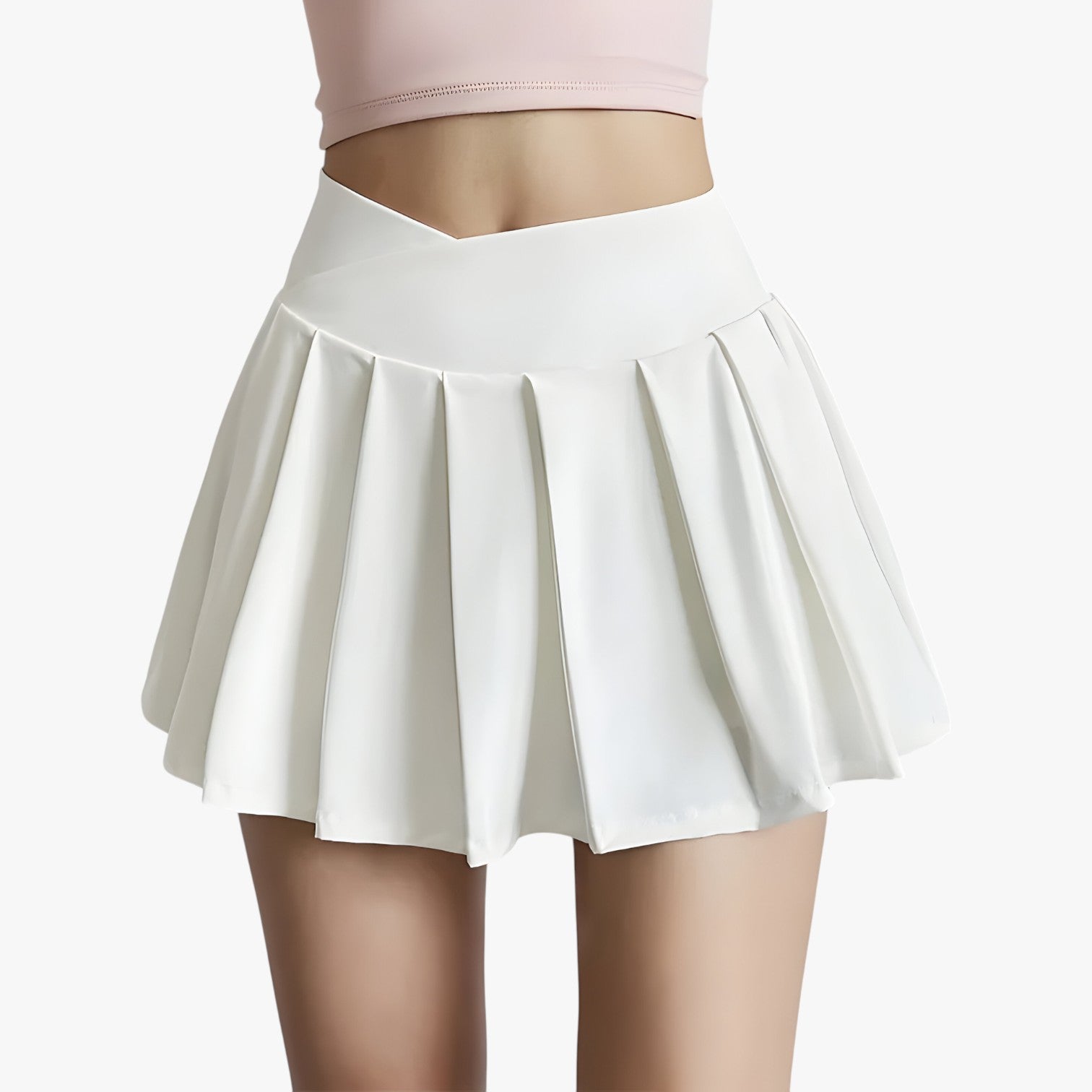 Luna | Højtaljet plisseret sportsskørt med indbyggede shorts - hvid - Luna | Højtaljet plisseret sportsskørt med indbyggede shorts - €25 - {{ product_tags }