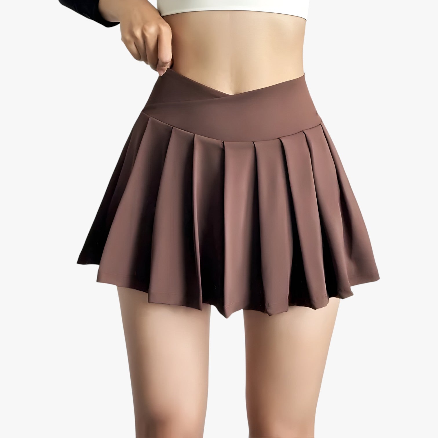 Luna | Højtaljet plisseret sportsskørt med indbyggede shorts - brun - Luna | Højtaljet plisseret sportsskørt med indbyggede shorts - €25 - {{ product_tags }