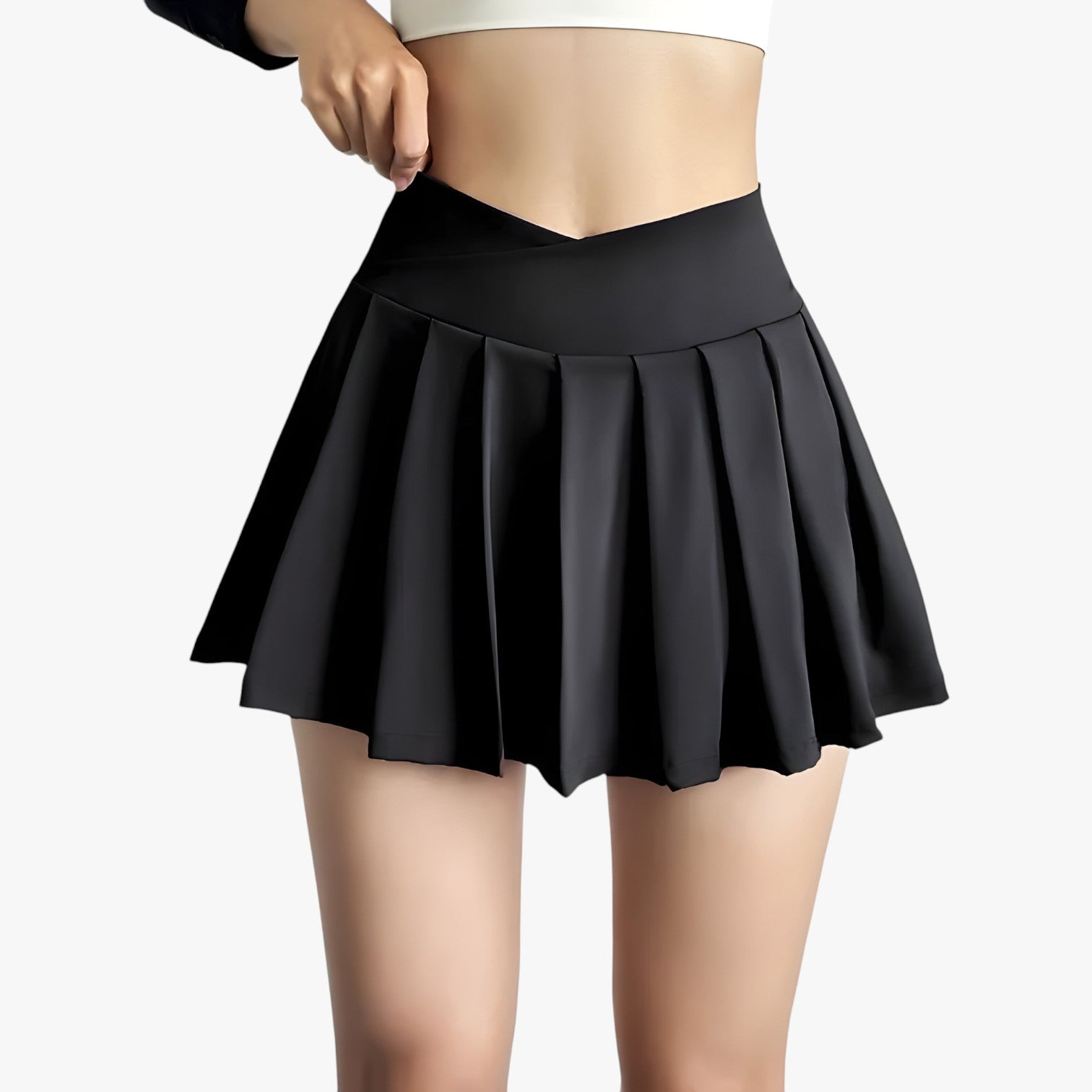 Luna | Højtaljet plisseret sportsskørt med indbyggede shorts - sort - Luna | Højtaljet plisseret sportsskørt med indbyggede shorts - €25 - {{ product_tags }