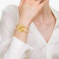 Vivian | Pulsera floral de acero inoxidable dorado, resistente al agua y elegante
