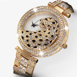 Heidi | Gold quartz watch with glitter and leopard motif