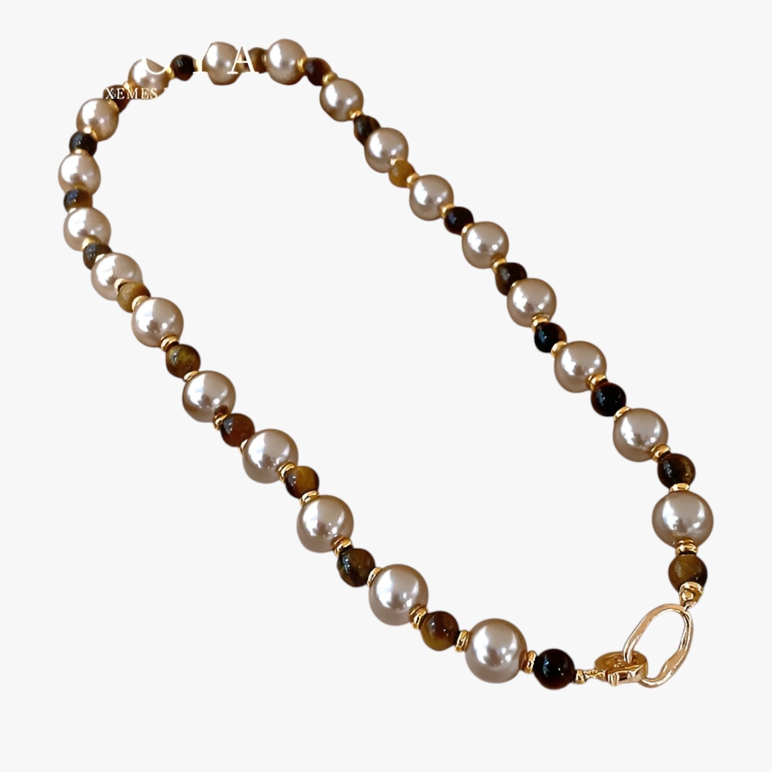Malia | Elegant tigerøje halskæde til et raffineret udseende - Gylden farve - women's fashion - {{ product_tags }