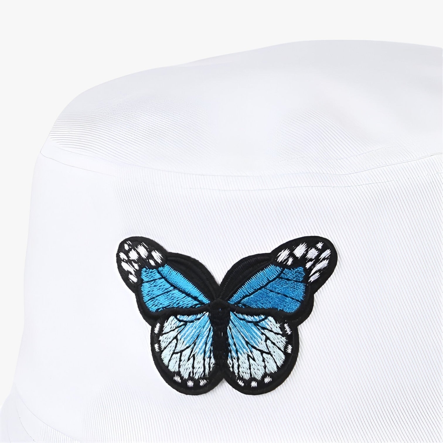 Brenda | Stilfuld solbeskyttelse med sommerfugleaccent – til aktive piger - - women's fashion - {{ product_tags }