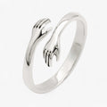 Ring i form af en omfavnelse