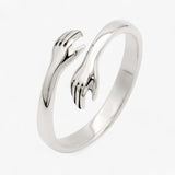 Ring in the Shape of an Embrace