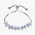 Zirkonia-blomma | Charmarmband - Elegant blomsterdesign